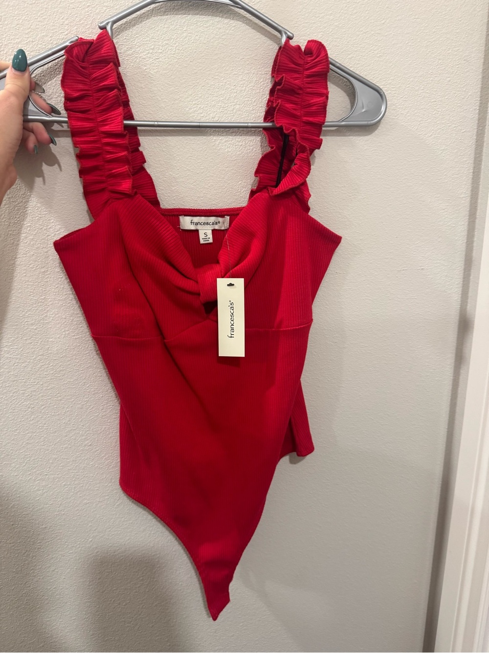 Francesca’s Red bow top body suit